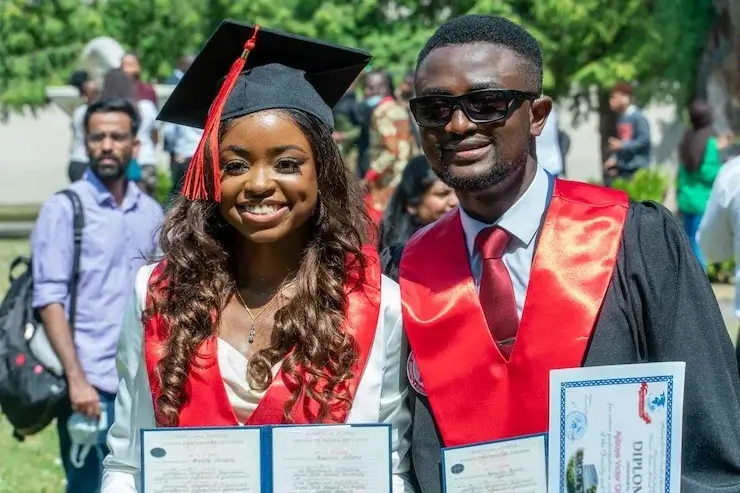 Graduands posing for a photo during their graduation ceremony