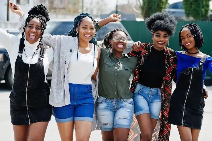 Happy girls in nice outfits